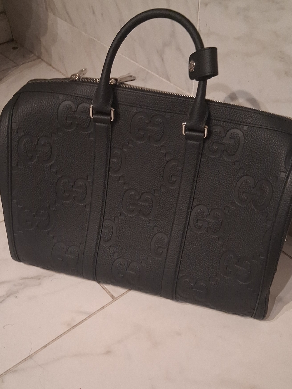 i Black Embossed Leather Travel Duffle